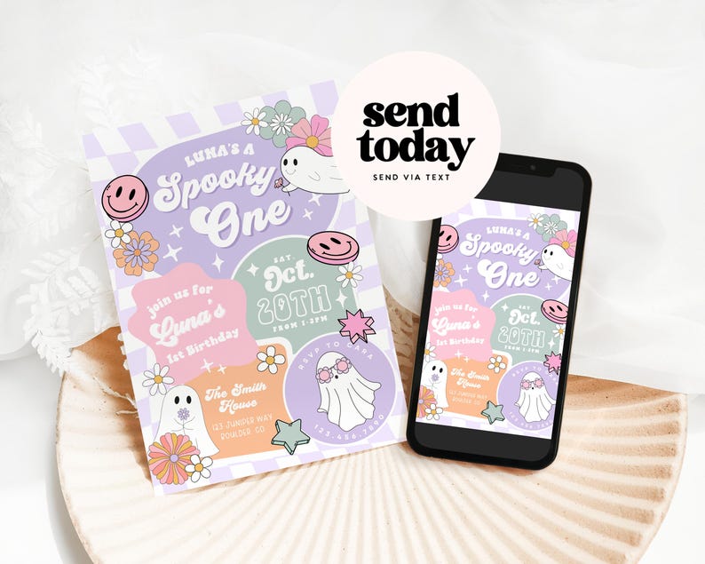 May include: A Halloween-themed invitation and a smartphone displaying the same design. The invitation features the text "LUNA'S A Spooky One" with ghost and flower illustrations in pastel colors. The smartphone shows the invitation design.