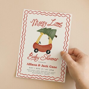 May include: A red and white baby shower invitation with a cartoon illustration of a red toy car carrying a Christmas tree. The text reads "Merry Little Baby Shower Honoring Allison & Jack Cane Sat Dec 3 at 2pm 9876 Sprig Lane, Boulder CO 44321 RSVP to Karlee at 123.456.7809 Registered at Target"