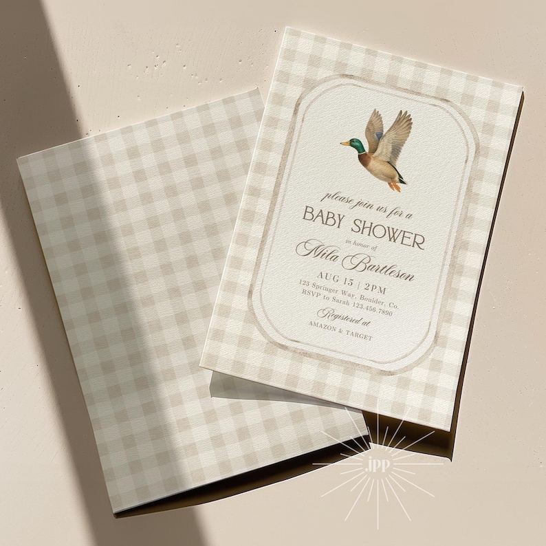 May include: Baby shower invitation with a beige gingham pattern. The invitation features a watercolor illustration of a duck in flight. The text reads "please join us for a BABY SHOWER" and includes event details.