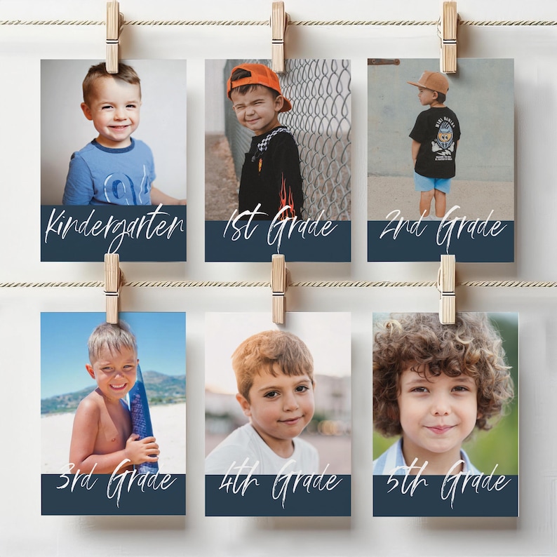 May include: Six photos of children, each labeled with a grade level from Kindergarten to 5th Grade. The photos are held by wooden clothespins on a string. Each photo features a child and the grade level written in a cursive font.