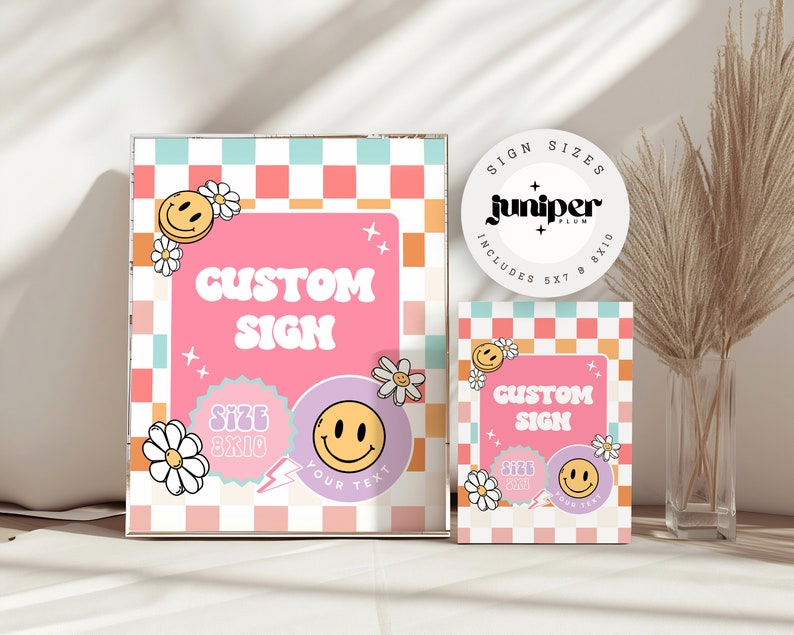 May include: Two pink and white checkered signs with a pink background and the text "Custom Sign" in a retro font. The signs are decorated with smiley faces, daisies, and lightning bolts. The text "Size 8x10" is on the left sign and "Size 5x7" is on the right sign. A white circle with the text "Juniper Plum" is in the upper right corner of the image.