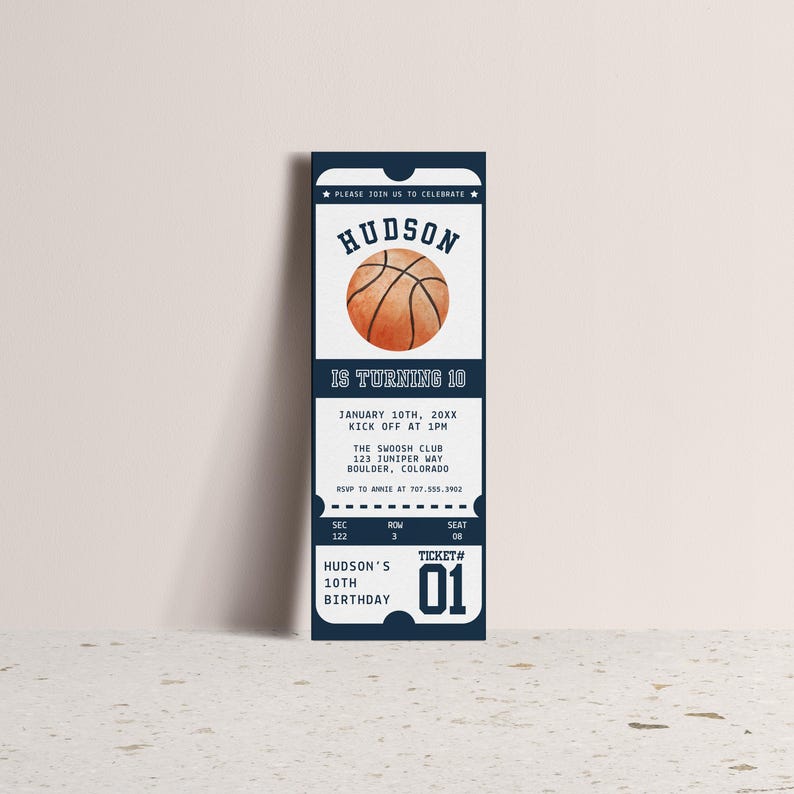 May include: A blue and white ticket-shaped invitation for a basketball-themed birthday party. The invitation says "Hudson is turning 10" and includes the date, time, and location of the party. The invitation also features a watercolor illustration of a basketball.