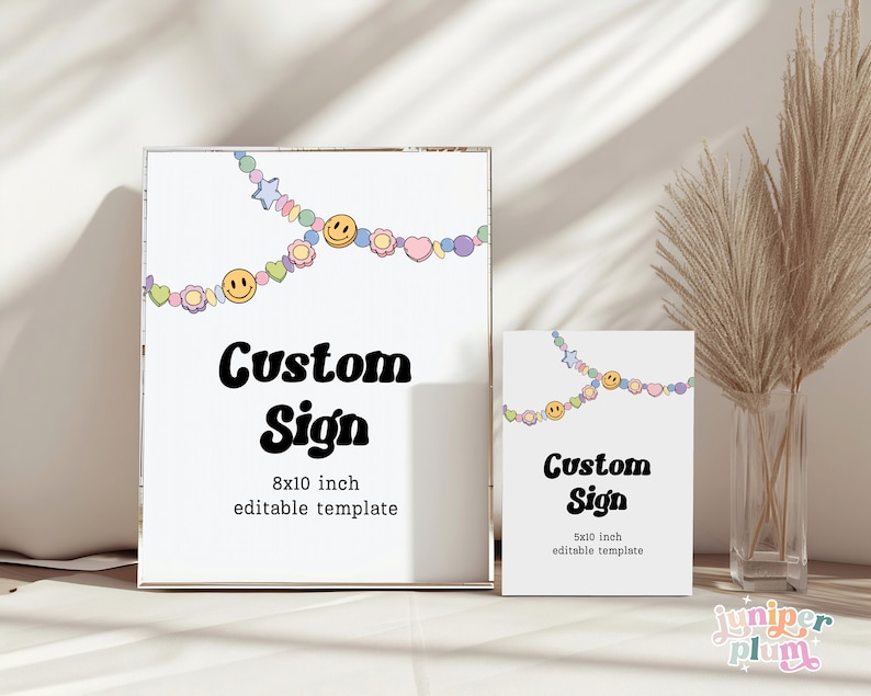 May include: Two printable custom sign templates with a colorful garland of smiley faces, hearts, and stars. The larger sign is 8x10 inches and the smaller sign is 5x10 inches.