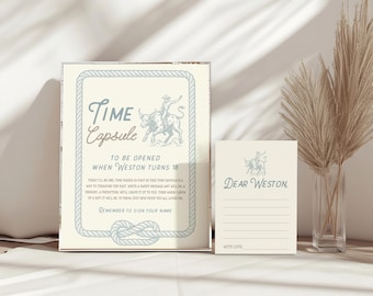 Könnte beinhalten: Ein cremefarbenes Zeitkapsel-Schild und Kartenset. Das Schild hat einen Seilrand und den Text "Time Capsule" und "To be opened when Weston turns 18". Die Karte sagt "Dear Weston" und "With Love".
