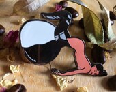 Woman slipping from a coffee pot enamel pin