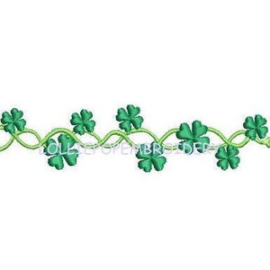 May include: A green four-leaf clover vine border design with a repeating pattern of clover leaves and stems.