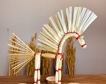 Wheat straw handmade Horse (1 item) Decorated with red ribbon.
