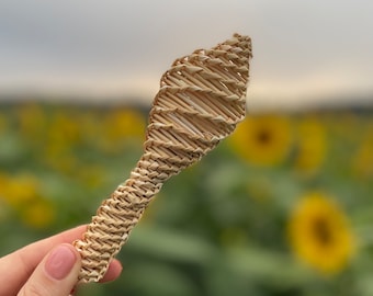 Straw weaving rattle toy. Handmade. Make sounds