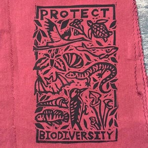protect biodiversity patch linocut threatened species