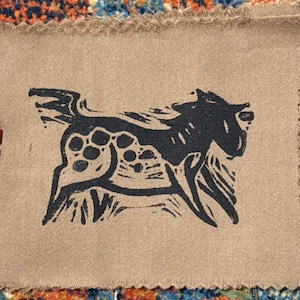 spotted cave horse patch linocut