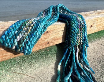 Vibrant Hand knit and hand dyed felted 100% wool scarf in turquoise and rainbow yarn