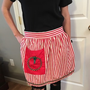Fantastic Vintage 1950s Christmas apron, in a cheery candy stripe print-super cute tiny pocket with wreath appliqué decoration