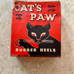 Set of Medium Vintage Cat&#39;s Paw Rubber Heels in OB-  Vintage Advertising- Halloween Decor- Vintage Store Stock- Black Cat Graphics- Orange