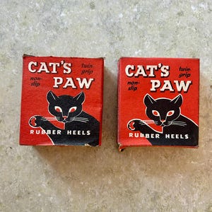 Set of 2 Medium Vintage Cat&#39;s Paw Rubber Heels in OB-  Vintage Advertising- Halloween Decor- Vintage Store Stock- Black Cat Graphics- Orange