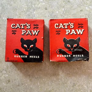 Set of 2 Large Vintage Cat&#39;s Paw Rubber Heels in OB-  Vintage Advertising- Halloween Decor- Vintage Store Stock- Black Cat Graphics - Orange