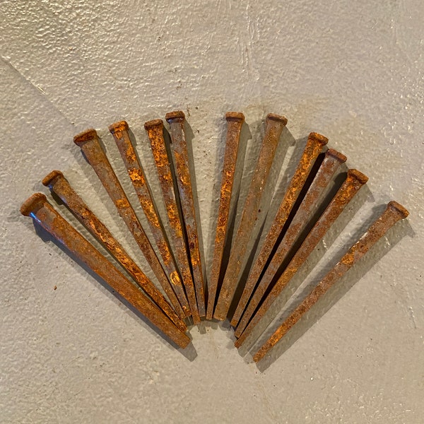 Set of 12 Vintage old stock square cut nails, large 4" long with a gorgeous rusty patina only time can produce. Nice large size!