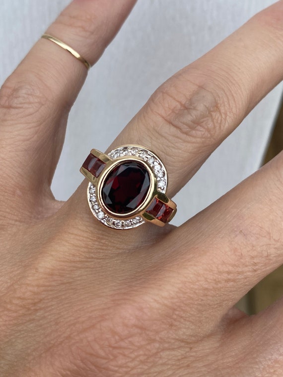 Bezel Set Oval Garnet Diamond Ring 14K Yellow Gold