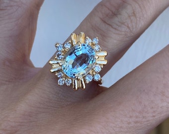 Oval Step Cut Blue Topaz Round Diamond 14K Yellow Gold Ring