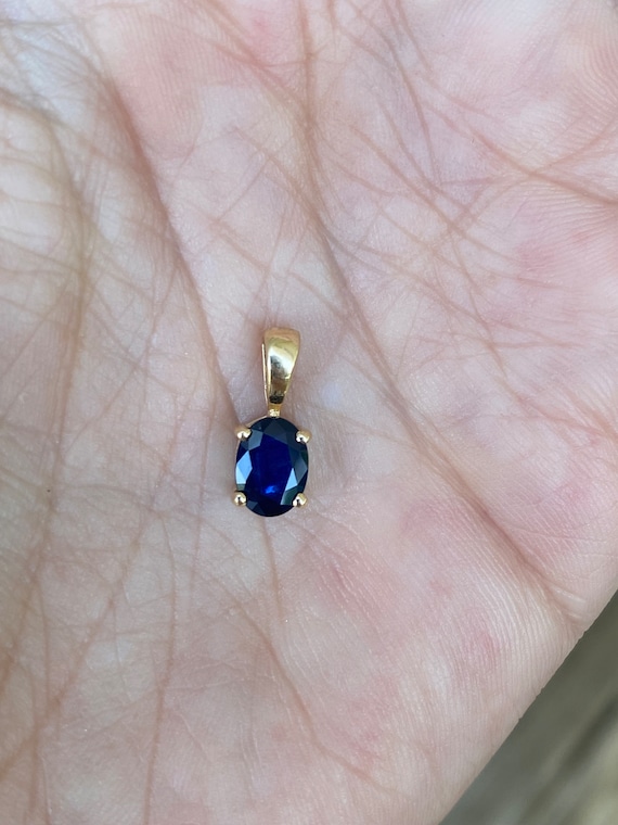 Oval Synthetic Blue Sapphire 14k Yellow Gold Penda