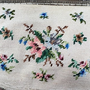 Vintage needlepoint bag sewn onto purse handle
