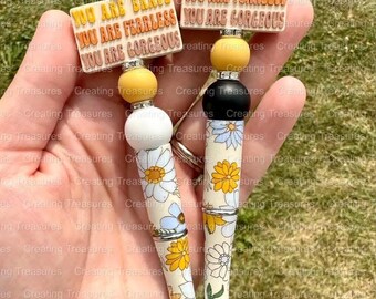 Bolígrafo con cuentas de inspiración floral