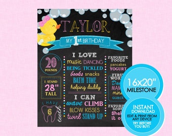 May include: A chalkboard style printable milestone poster for a first birthday. The poster features a yellow rubber duck with a pink bow, the name "TAYLOR", and a list of milestones including weight, height, and skills. The poster is 16x20 inches and includes an instant download option.