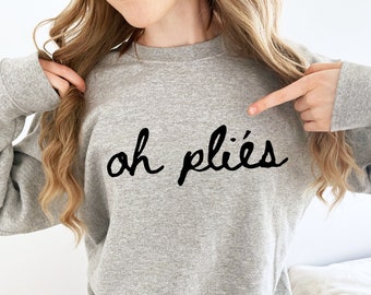 May include: Gray sweatshirt with the text "oh plies" written in black cursive.