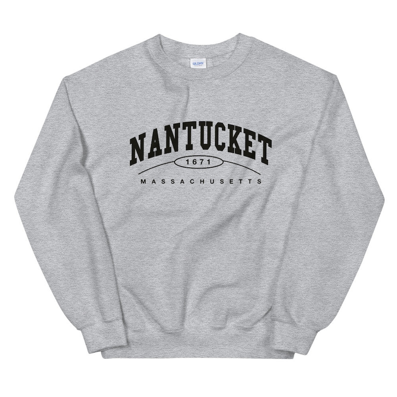 May include: Gray sweatshirt with black text that reads "NANTUCKET 1671 MASSACHUSETTS"