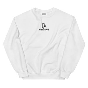 May include: White sweatshirt with a black outline of the state of Rhode Island and the text "RHODE ISLAND" underneath.