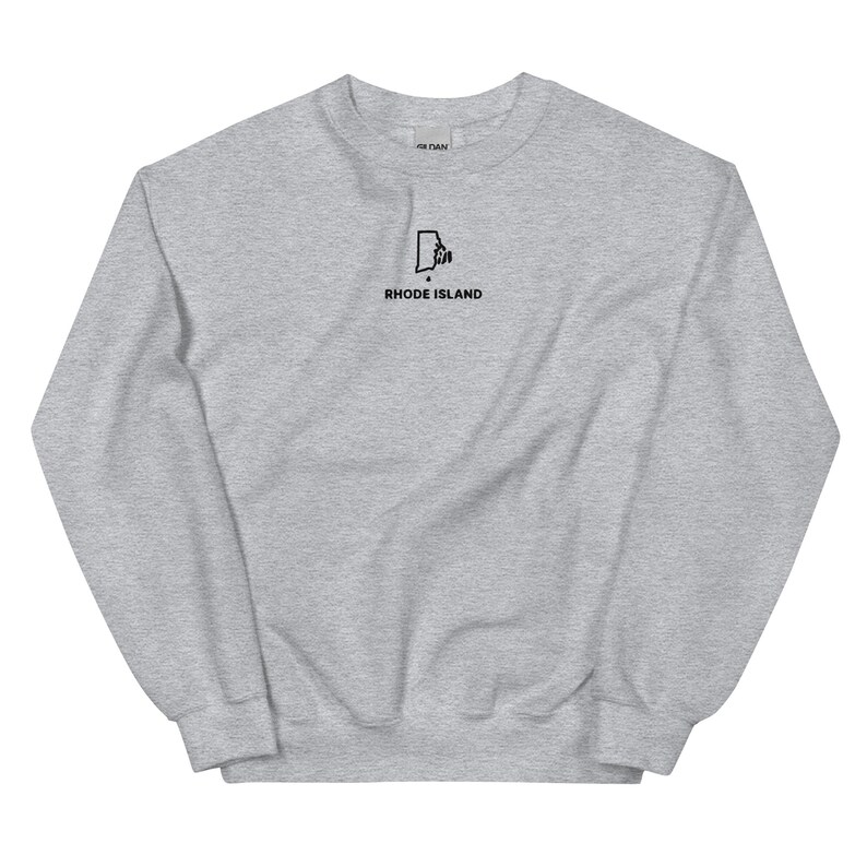 May include: A gray sweatshirt with a black outline of the state of Rhode Island and the text "RHODE ISLAND" underneath.