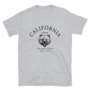 May include: Gray t-shirt with a black graphic of a bear's head and the text "CALIFORNIA 1850 GOLDEN STATE WEST COAST"