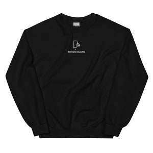 May include: Black sweatshirt with a white outline of the state of Rhode Island and the text "RHODE ISLAND" underneath.