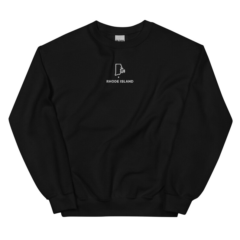 May include: Black sweatshirt with a white outline of the state of Rhode Island and the text "RHODE ISLAND" underneath.