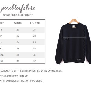 May include: A size chart for a crewneck sweatshirt, showing the width and length measurements in inches for sizes S through 3XL.