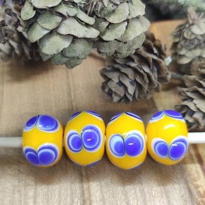 Set of 4 handmade lampwork glass beads based on Celtic models