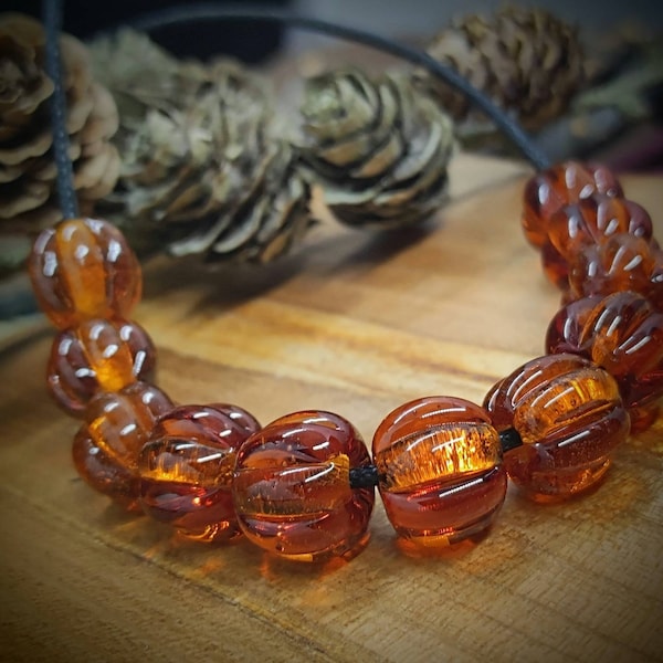 Bead set 10+1 amber colored topaz brown melon glass beads