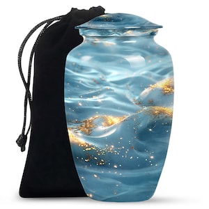 May include: A blue and gold cremation urn with a swirling wave pattern. The urn has a lid and comes with a black velvet bag.