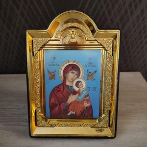 Orthodox modern printed icon Virgin Mary Christ. Icon of the Mother of God with little Jesus