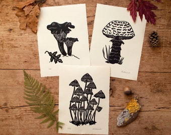 Mushroom lino prints. Options of fairy inkcaps, prince mushroom and chanterelles. Hand printed onto cream Fabriano paper