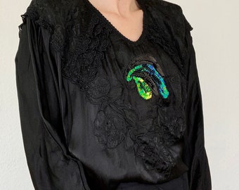 Belle blouse vintage à manches longues en noir avec des paillettes 70 années 80 disco