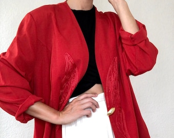 Very nice vintage blazer in red with wide cut long sleeves 70s 80s