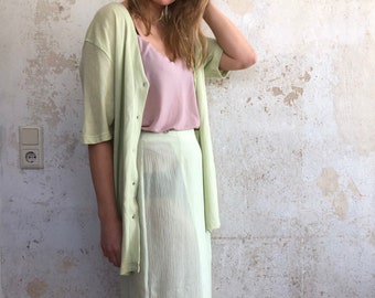 Very nice vintage two-piece in mint green wrap skirt and jacket / blouse