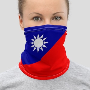 May include: A blue and red face mask with a white sun and stars design. The mask is made of a soft, breathable fabric and is perfect for everyday wear.