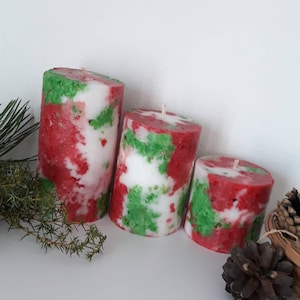 Festive decorative candles. Green red pillar candles. Christmas candles. Holiday candles for hygge christmas