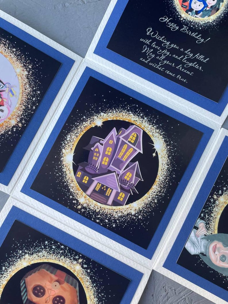 May include: Four different greeting cards with a blue border and a white background. Each card features a different illustration with a dark blue background and a gold glitter effect. The illustrations include a haunted house, a robot, a character from a movie, and a character from a cartoon.