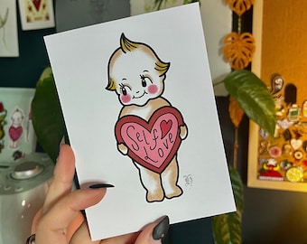 May include: A vintage-style illustration of a cherubic baby holding a large pink heart with the words "Self Love" written on it.