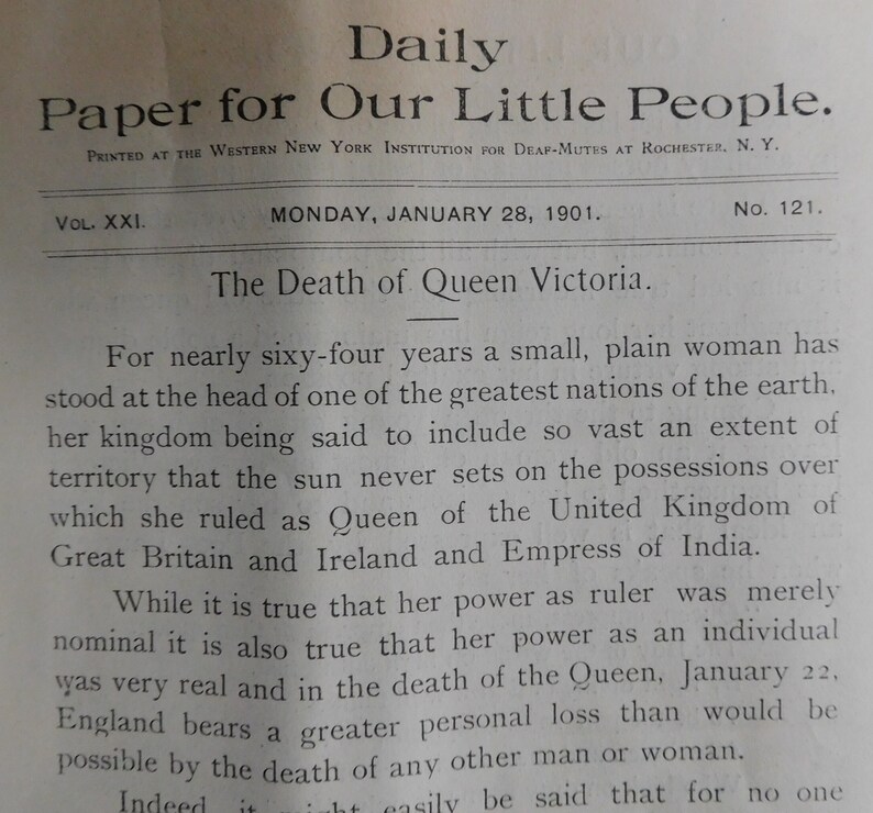 May include: A black and white newspaper article from January 28, 1901, titled "Daily Paper for Our Little People." The article discusses the death of Queen Victoria and her reign over the United Kingdom of Great Britain and Ireland.