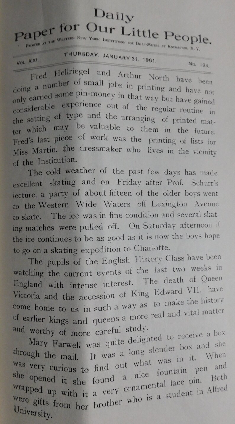May include: A black and white newspaper article from January 31, 1901, titled "Daily Paper for Our Little People." The article discusses the activities of students at the Western New York Institution for Deaf-Mutes in Rochester, New York. The article mentions skating, a lecture, and the death of Queen Victoria.