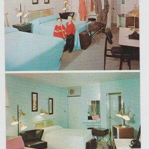 May include: Two hotel rooms with light blue walls, white bedding, and mid-century modern furniture. The first room has two beds, a dresser, and a lamp. The second room has one bed, a couch, a desk, and a chair.