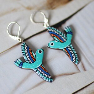 Hand - painted flying birds earrings. Dangle orange - turquoise wooden bird earrings. Ukrainian art, Psychedelic blue birds earrings